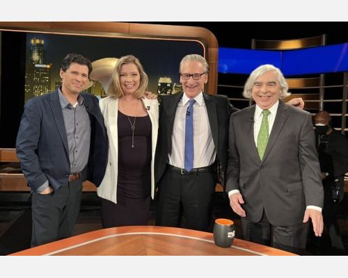 Bill Maher with Ernest Moniz, Kristen Soltis, and Max Brooks on set.