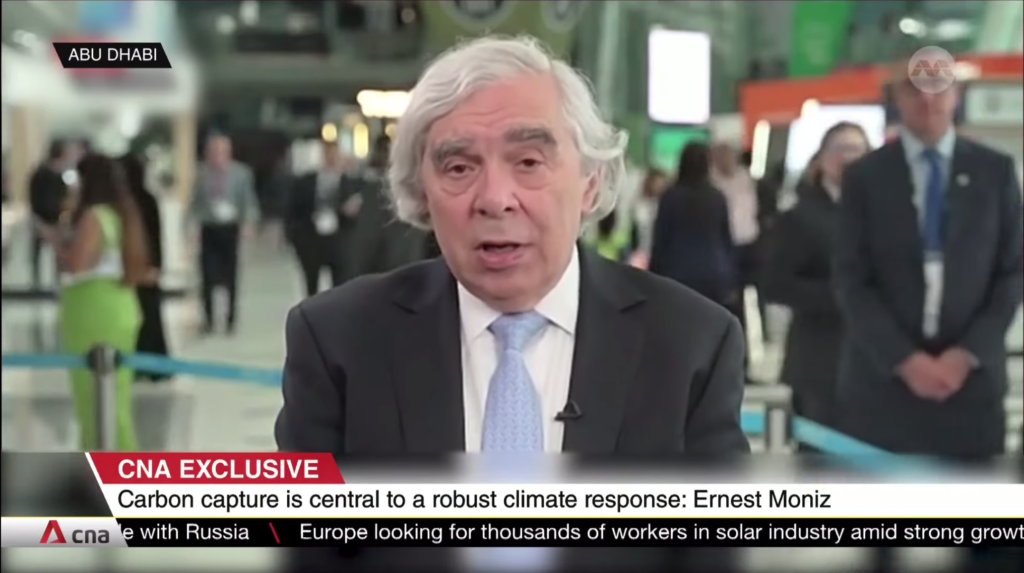 Ernest Moniz on Channel NewsAsia with a banner that reads "CNA Exclusive: Carbon capture is central to a robust climate response: Ernest Moniz"