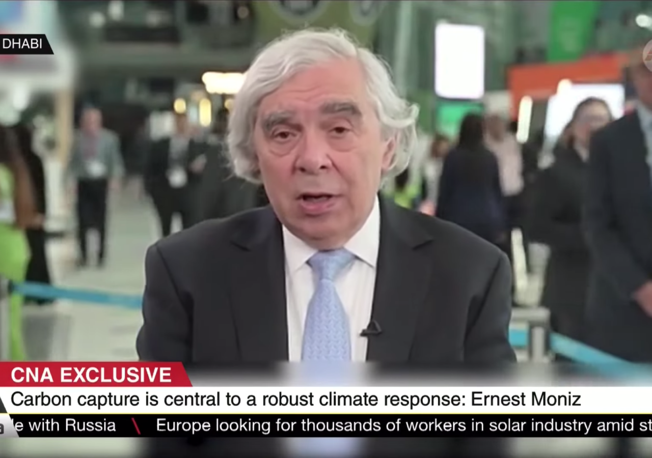 Screen capture of Ernest Moniz on Channel NewsAsia with a banner that reads 